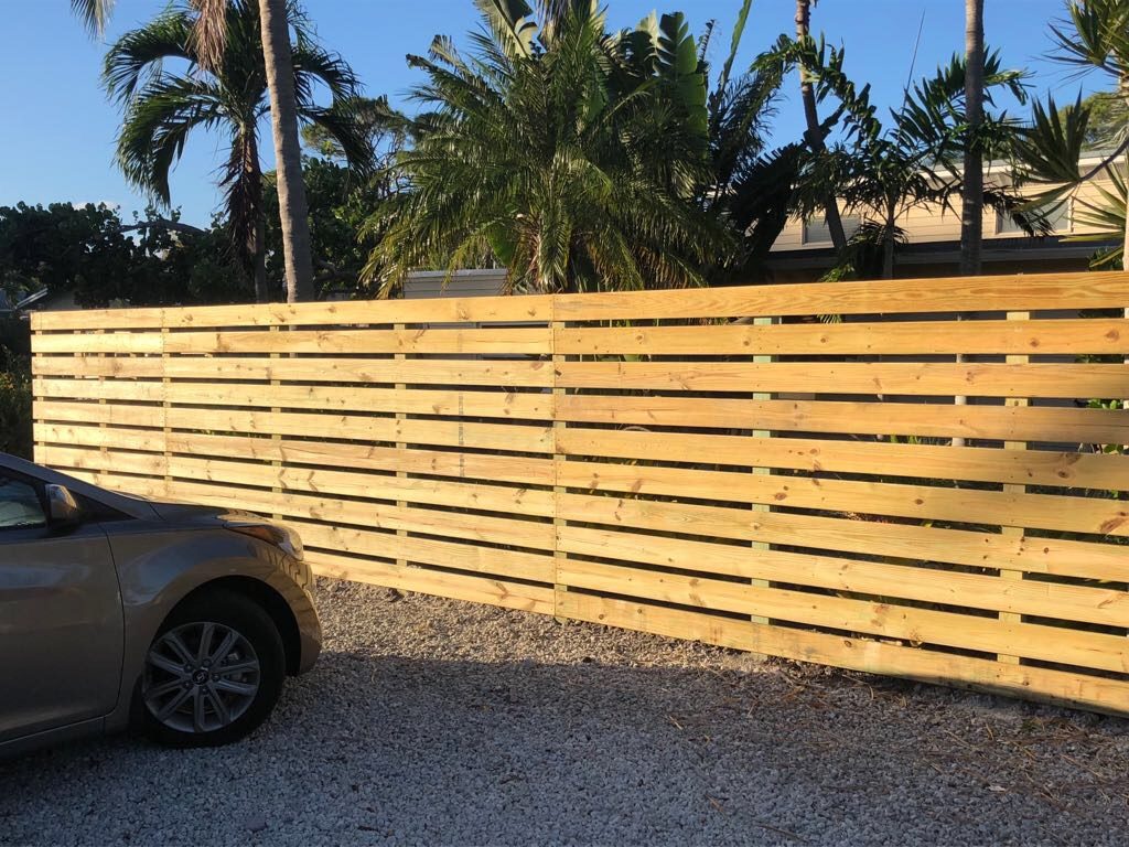 wood fence installation plantation fl